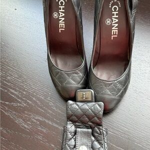 Authentic CHANEL Black Quilted Leather Pumps with Turnlock Detail